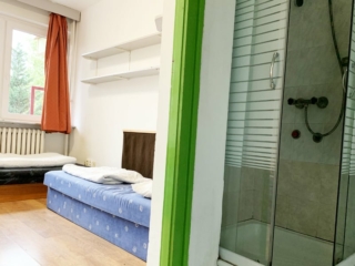 En suite shower and shared toilets